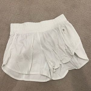 Lululemon track that short. Color:white.